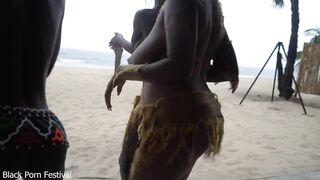 3 African tribe witches doing a dancing ritual for making rain