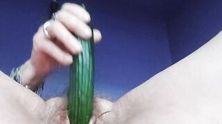 Granny fucks hairy pussy with cucumber